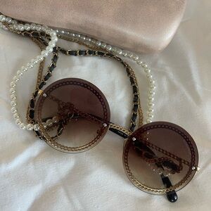 Chanel sunglasses with the chain